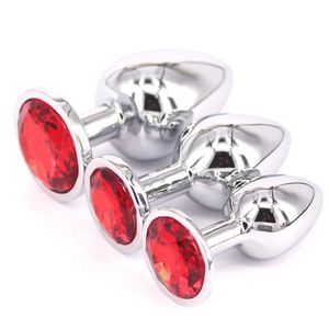Eastern Delights® 3 piezas de joyería, tapón anal chapado en acero metal para las nalgas con preservativo (rojo).