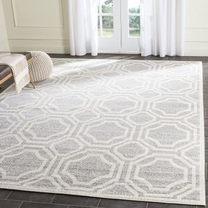 Tapete Safavieh Amherst Collection AMT411A para interiores/exteriores de color marfil y verde claro, Polipropileno